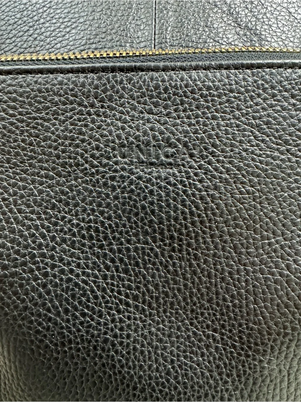 Black Pebbled Leather Backpack with Gold Zipper